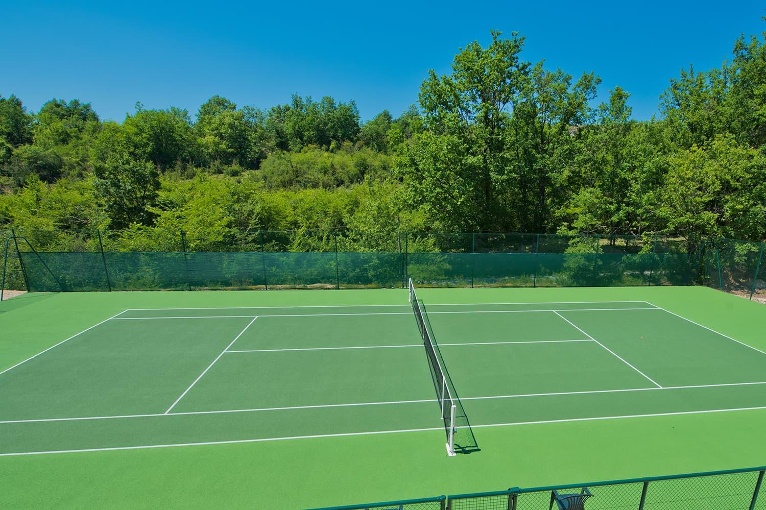 Two FloodLit Tennis Courts